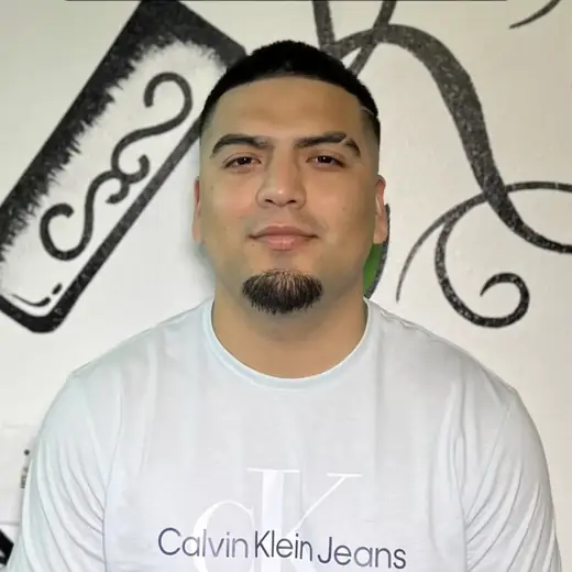 Izzy Romero, barber at Kings Korner in San Marcos, Texas